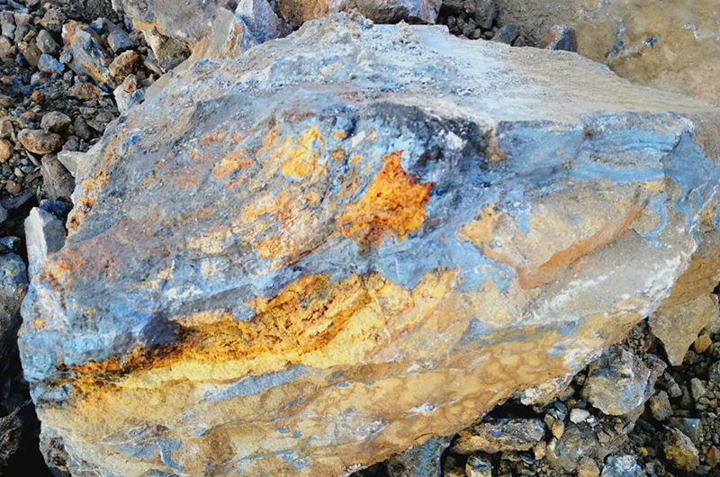 A big chunk of manganese ore amongst smaller ones